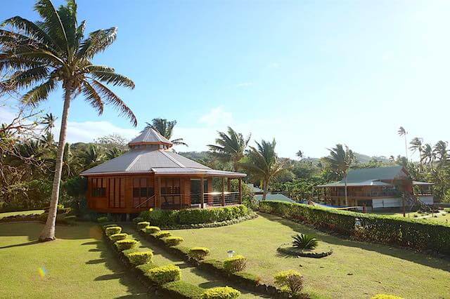 “Spacious grand villas in Fiji featuring elegant architecture, lush tropical surroundings, and luxurious amenities for an unf